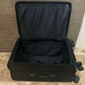 TUMI Short Trip Expandable 4 Wheeled Packing Case